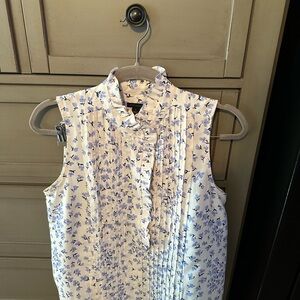 Ann Taylor lovely blue and white sleeveless blouse size small.
